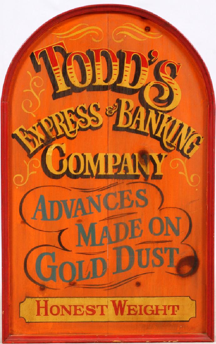 TODD'S EXPRESS & BANKING SIGN H 36", W 22": TODD'S EXPRESS & BANKING SIGN H 36", W 22" Wood framed painted sign with an arched top edge and inscribed: "Todd's Express & Banking Company Advances Made On Gold Dust Honest Weight".