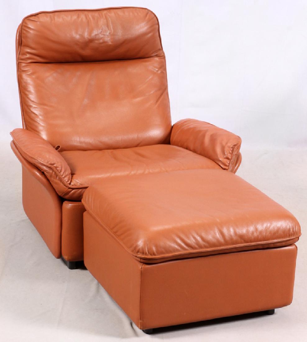 DE SEDE LEATHER LOUNGE CHAIR AND OTTOMAN: DE SEDE LEATHER LOUNGE CHAIR AND OTTOMAN, 20TH C., 2 PIECES, H 34", W 34", D 36":The reclining chair and matching ottoman both upholstered in caramel-coated leather. Chair: H 34", W 34", D 36". Ottoma