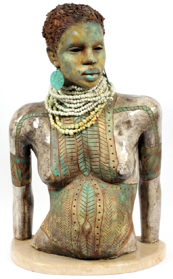 WOODROW NASH PAINTED CERAMIC FERTILITY SCULPTURE: WOODROW NASH (AMER. B-1948), PAINTED CERAMIC FERTILITY SCULPTURE, 2007, H 27", W 17", AFRICAN FEMALE TORSO :Depicts a sculpture of an African female torso, with cowrie shell necklace and blue disk ear