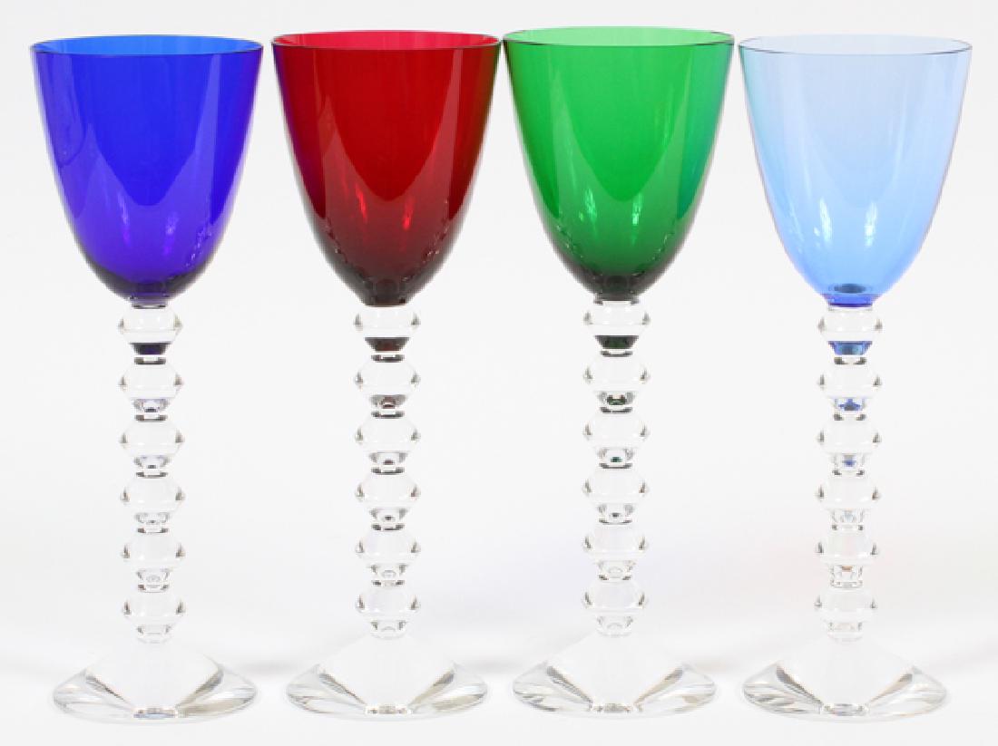 BACCARAT 'VEGA' BLOWN RHINE WINE GLASSES, SET OF 4: BACCARAT 'VEGA' BLOWN RHINE WINE GLASSES, SET OF 4, H 9" :A set of four rhine wine glasses in the "Vega" pattern by Baccarat, having clear stems with colored tops; each has the original box.
