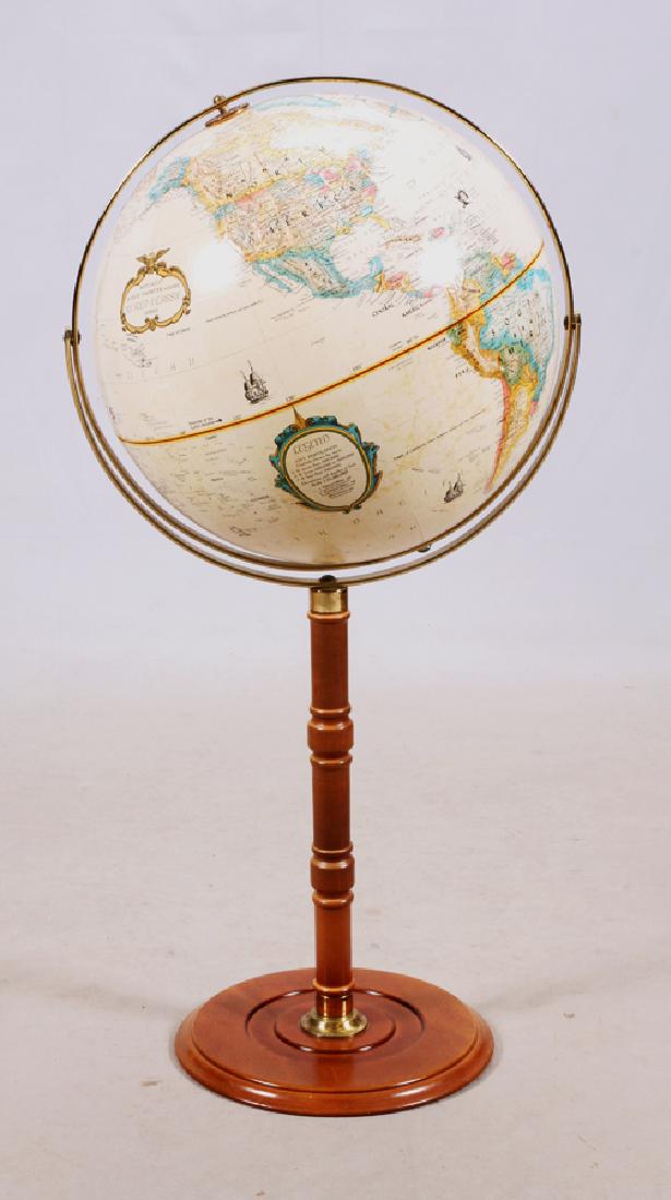 REPLOGLE "WORLD CLASSIC SERIES" GLOBE OF THE WORLD: REPLOGLE, "WORLD CLASSIC SERIES", GLOBE OF THE WORLD, H 43" (APPROX), DIA 16" (GLOBE) Having gold tones and mounted onto a gimballed brass ring and turned pedestal with brass trimmed round base.