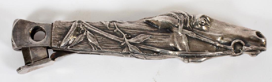 RACE-HORSE FORM SILVER CIGAR-CUTTER: RACE-HORSE FORM SILVER CIGAR-CUTTER, 'GOOD WORKING CONDITION' NO MARKS, H 1 1/2", L 5 3/4" No marks. Good to Fair condition. Njd.