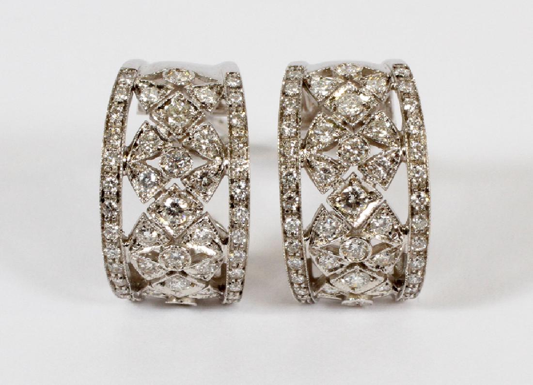 18KT WHITE GOLD AND DIAMOND CHIMENTO EARRINGS: 18KT WHITE GOLD AND DIAMOND CHIMENTO EARRINGS, W 7/16", L 3/4"A pair of diamond white gold Chimento earrings. Full cut round diamonds. 1-3 points per diamond. H-I color, Vs-2/Si-1 clarity Total weight
