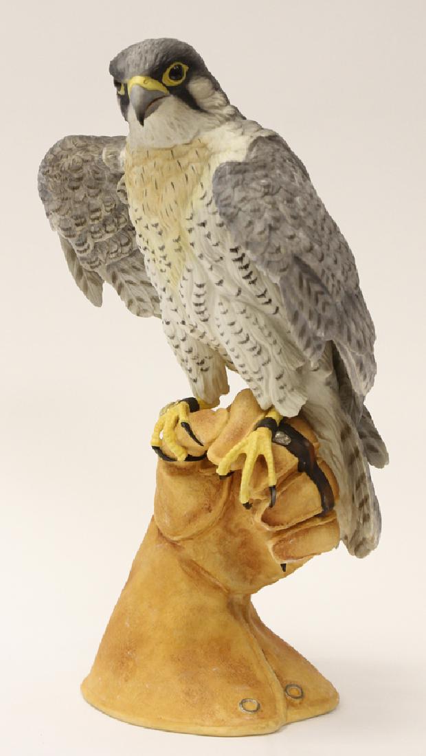 HELEN BOEHM SIGNED PORCELAIN FALCON SCULPTURE: HELEN BOEHM SIGNED, LIMITED EDITION, PORCELAIN FALCON SCULPTURE, 1991, H 17", W 10", D 7", "PEREGRINE FALCON ON A GLOVE", #16 :Boehm bisque porcelain sculpture depicting a Peregrine Falcon perched on 