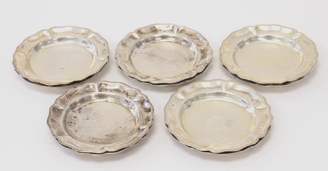 STERLING SILVER BUTTER PLATES, 10 PCS.: STERLING SILVER BUTTER PLATES, 10 PCS., DIA 3 1/2" :Having contoured rims and marked .925 on the underside. 13.17 tr oz. total silver wt.