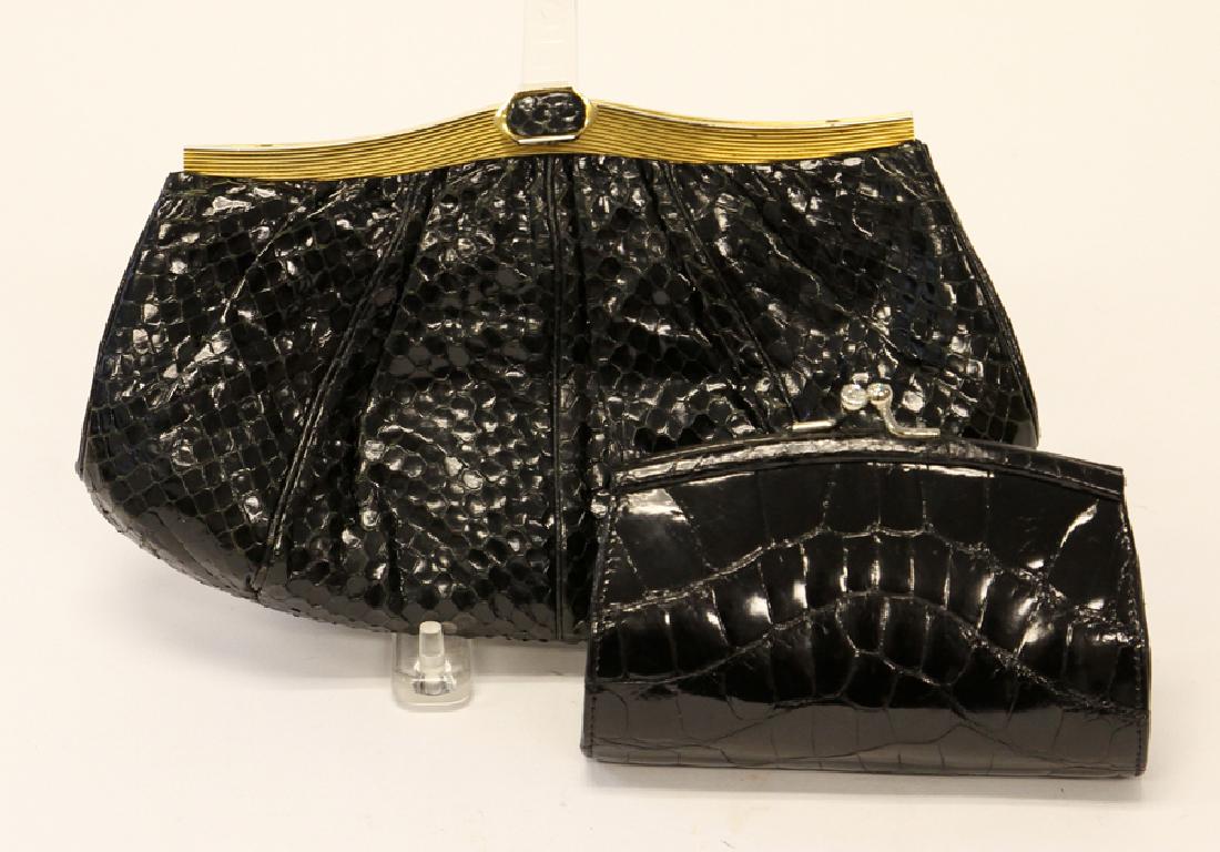 JUDITH LEIBER BLACK SNAKESKIN CLUTCH WITH CHAIN: JUDITH LEIBER, BLACK SNAKESKIN CLUTCH WITH CHAIN, AND SMALL LEATHER CLUTCH, 2 PCS.:Two clutches by Judith Leiber. One is a black snakeskin clutch with chain and a second of black leather with a alliga