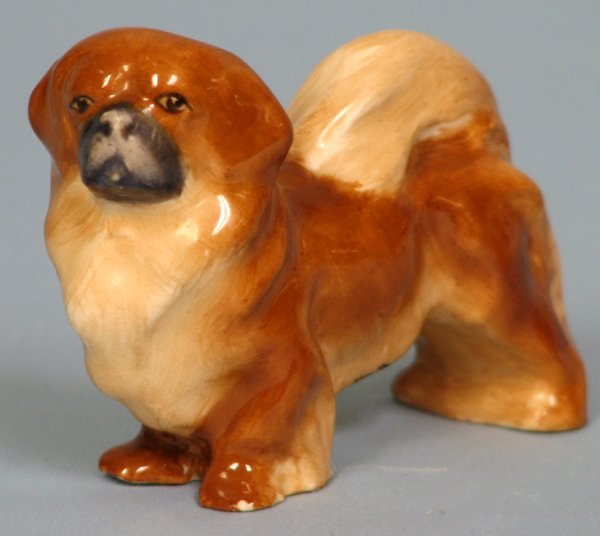 ROYAL WORCESTER PORCELAIN PEKINGESE C.1950: ROYAL WORCESTER PORCELAIN FIGURE OF A PEKINGESE C. 1950, H 2 1/4", W 22 3/4":By Doris Lindner c. 1950, hand painted, style 2941 (rev.20070608)