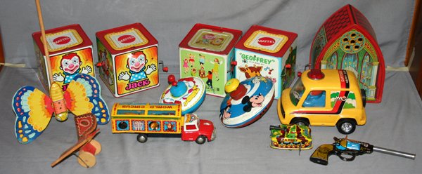 METAL JACK-IN-THE-BOXES, TOPS, ETC, C.1960: MATTEL AND ROMPER ROOM METAL JACK-IN-THE-BOXES, TOPS, ETC, C 1960, 13 PCS.:includes 3 Mattel Jack-In-The-Boxes, 6" x 6" x 6", 1 Romper Room Jack-In-The-Box, 6" x 6" x 6", 2 mechanical spinning tops, 5