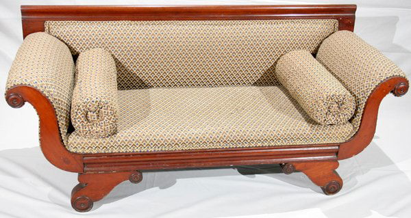 MAHOGANY DUNCAN PHYFE STYLE CHILD'S SETTEE: AMERICAN CARVED MAHOGANY DUNCAN PHYFE STYLE CHILD'S SETTEE, 19TH CENTURY, H 21", L 49":Having rolled arms, scrolled feet and beige silk Damask upholstery. Ex prominent collector, Ann Arbor, Mi.