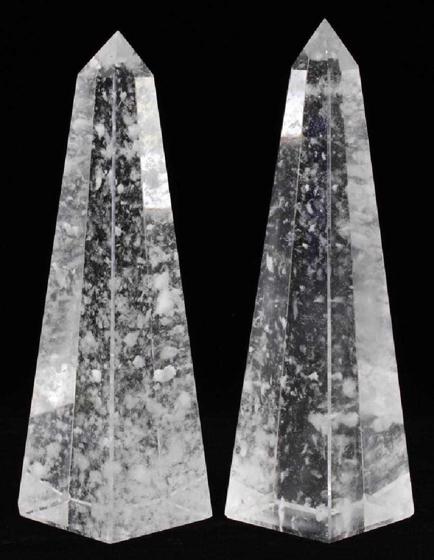 ROCK CRYSTAL OBELISKS, PAIR: ROCK CRYSTAL OBELISKS, PAIR, H 11 1/2", W 3", L 3" :Rock crystal clear obelisks having a snow flake pattern on the interior.