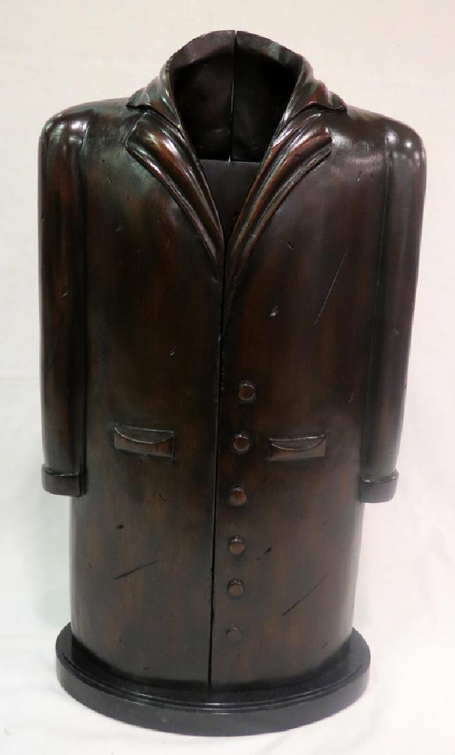 'WAISTCOAT' GENTLEMAN'S JEWELRY BOX WITH DRAWERS: MAITLAND-SMITH, 'WAISTCOAT', GENTLEMAN'S JEWELRY BOX WITH DRAWERS, H 21", W 12", D 6" :In the form of a waist coat with both side of the front of the coat opening to reveal two small drawers Carved wo