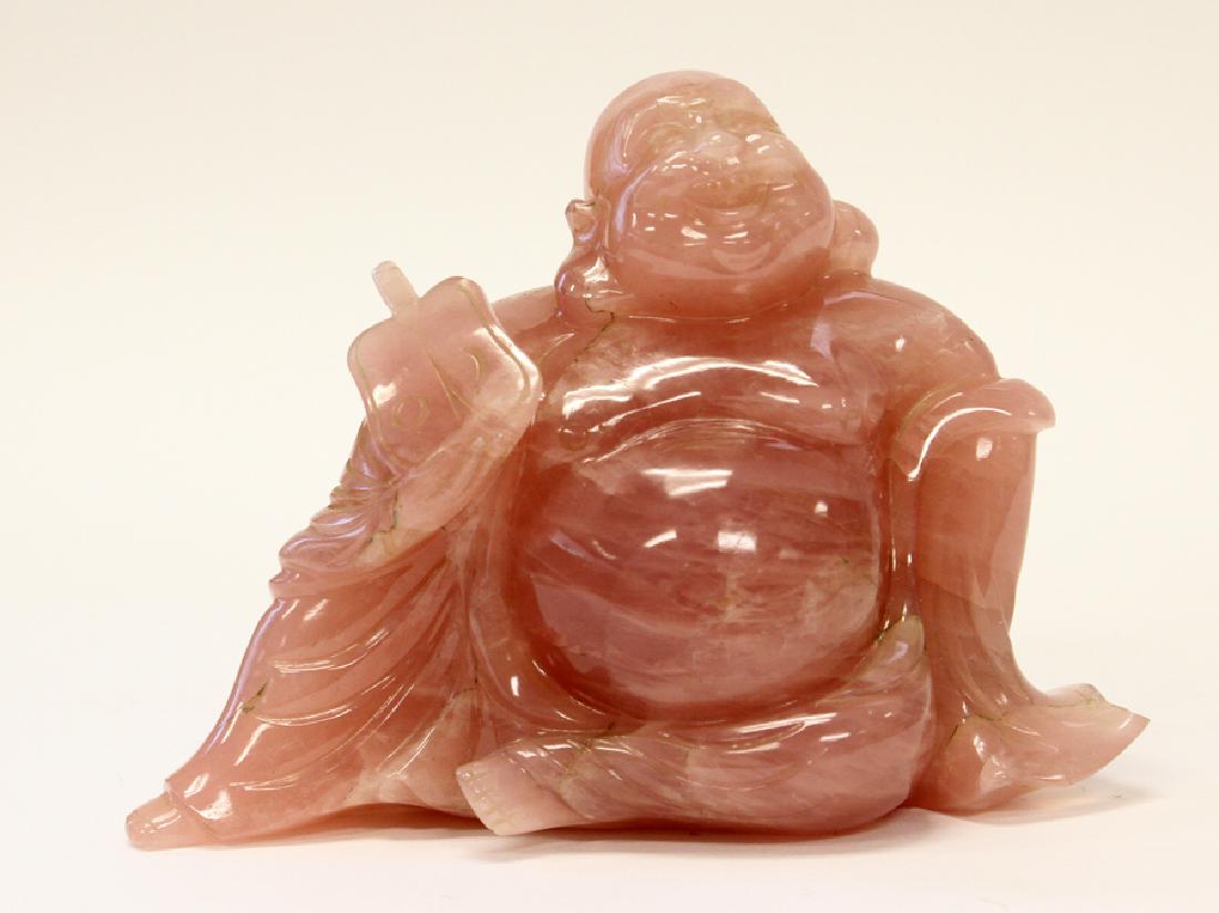 CHINESE, PINK QUARTZ BUDDHA SCULPTURE: CHINESE, PINK QUARTZ BUDDHA SCULPTURE, H 6", W 7 1/2", D 3 1/2" :Chinese, hand carved, pink quartz, reclining Buddha sculpture.