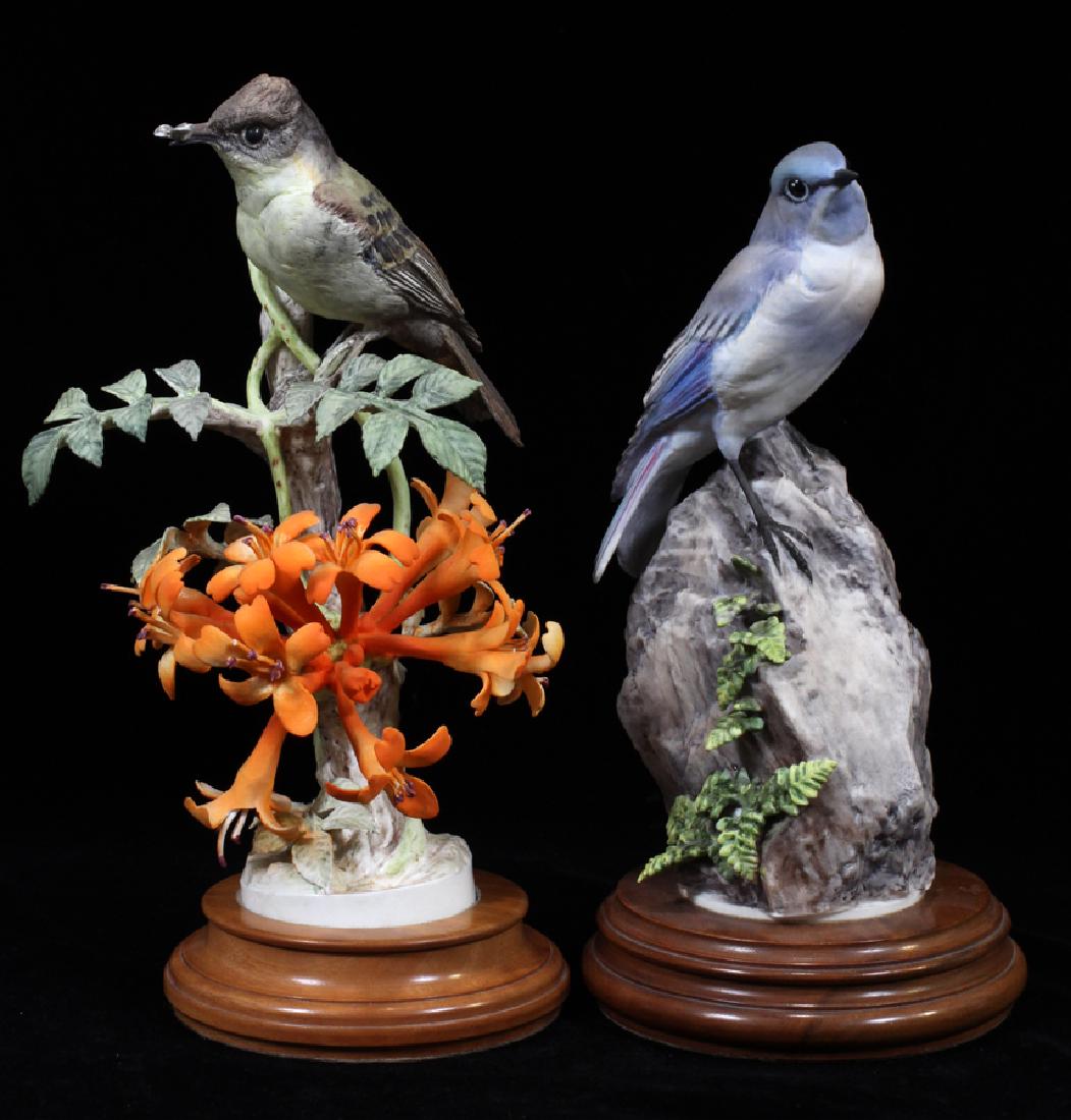 ROYAL WORCESTER BISQUE PORCELAIN BIRD FIGURINES: ROYAL WORCESTER BISQUE PORCELAIN BIRD FIGURINES, PAIR, H 10 1/2", DIA 5 1/4":A pair of hand-painted bisque porcelain Royal Worcester figurines. The grouping includes "Phoebe Sayornis Phoebe & Flame Vi
