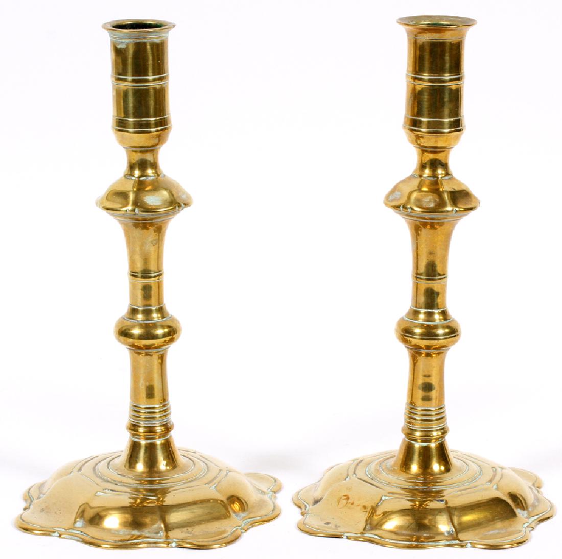 QUEEN ANNE BRASS PETAL BASE CANDLESTICKS, C. 1750