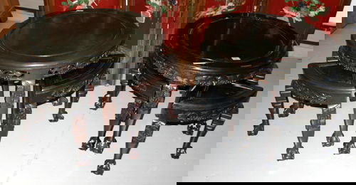 CHINESE CARVED WOOD TEA TABLE AND STOOLS, LATE 19: CHINESE CARVED WOOD TEA TABLE AND STOOLS, LATE 19TH CENTURY, TWO SETS, H 20" & 16", TEN PIECES Including 2 round tea tables, each with a set of 4 nesting three-legged stools; table having a carved and