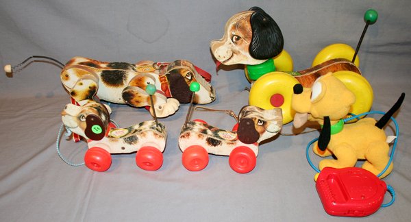 FISHER PRICE WOODEN DOG PULL TOYS + PLUTO TOY: FISHER PRICE WOODEN DOG PULL TOYS + PLUTO TOY, 5:Two of the toys are "Little Snoopy" and are 7" long. The other two are "Wobbles" and "Snoopy", both are 13" long. The Pluto toy is battery operated and