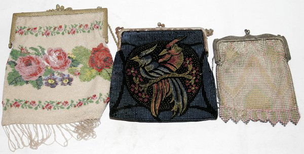 VINTAGE PURSES, THREE, L6"-8": VINTAGE PURSES, THREE, L 6"-8":Including 1 beaded purse with a gilt metal frame, band of roses, L.8 1/2"; 1 mesh purse, L.6"; and 1 other, L.7".