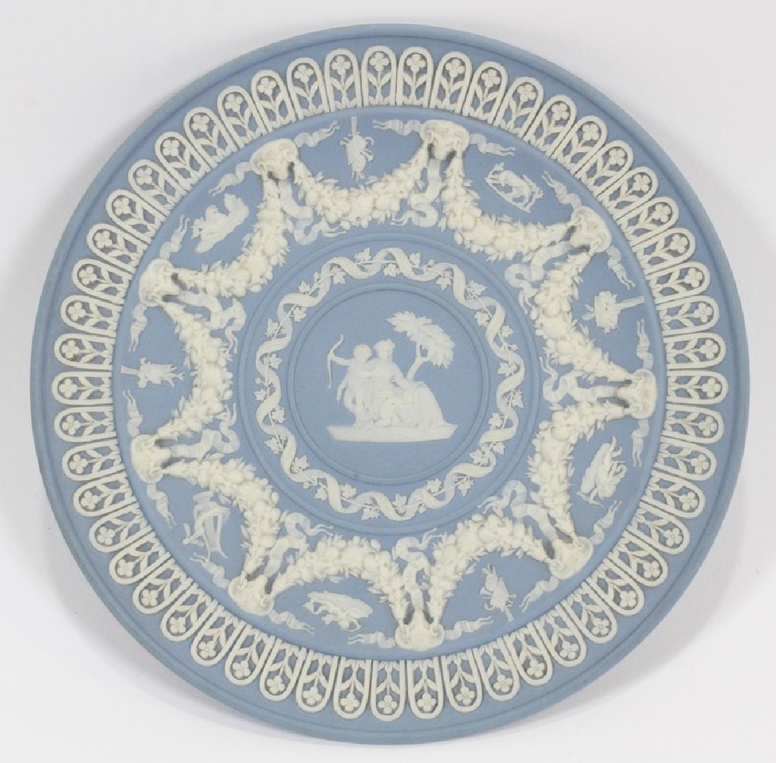 WEDGWOOD JASPERWARE POTTERY TROPHY PLATE, 19TH C: WEDGWOOD JASPERWARE POTTERY TROPHY PLATE, 19TH C, DIA 6":Rare 19th c Wedgwood Jasperware trophy plate. Having a light blue ground with raised white intricate details of rams heads, cherubs, flowing ri