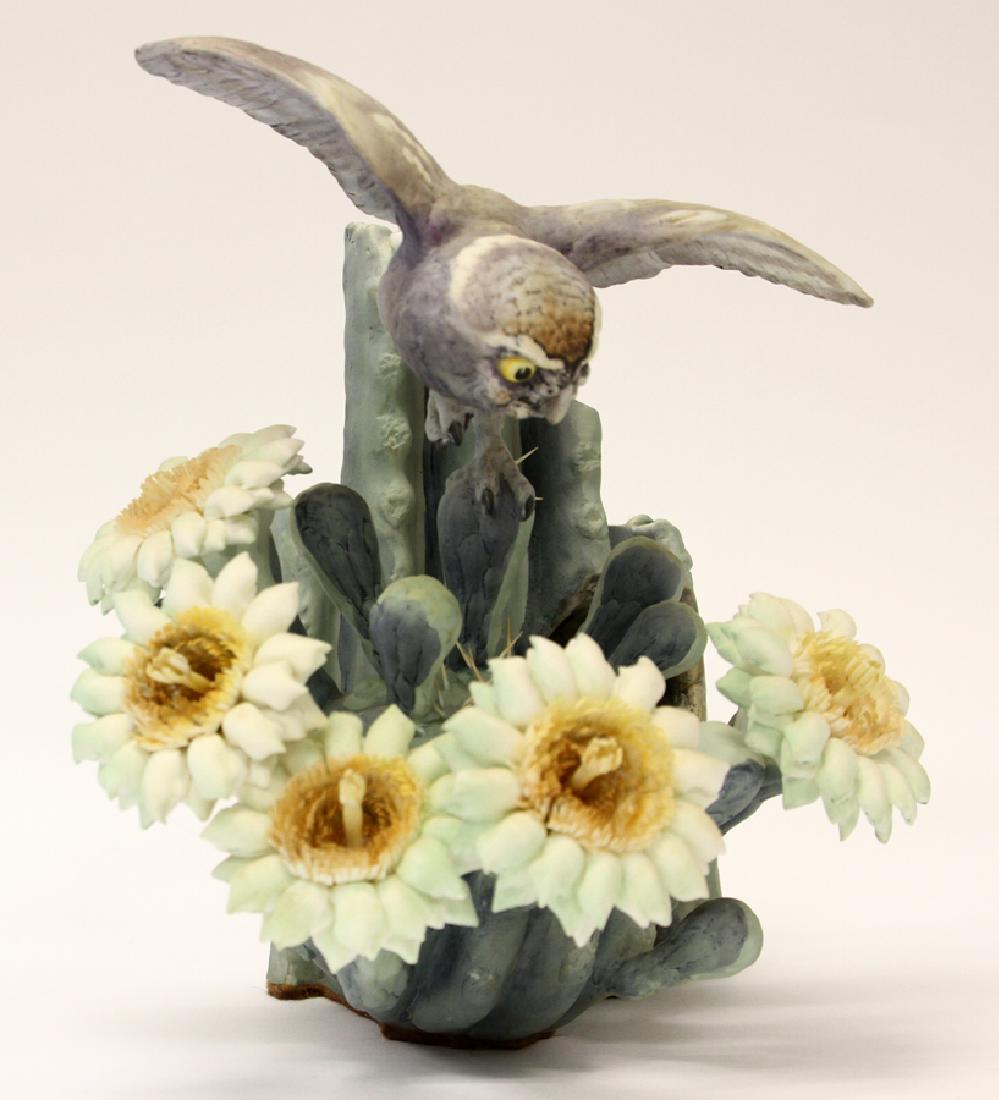 ROYAL WORCESTER SIGNED LIMITED ED. BIRD SCULPTURE: ROYAL WORCESTER, SIGNED, LIMITED EDITION, FINE BONE CHINA, BIRD SCULPTURE, H 10", W 8", D 7", "MOONLIGHT ELF OWL AND SAGUARO" Royal Worcester fine bone china bird sculpture signed by Dorothy Doughty. 