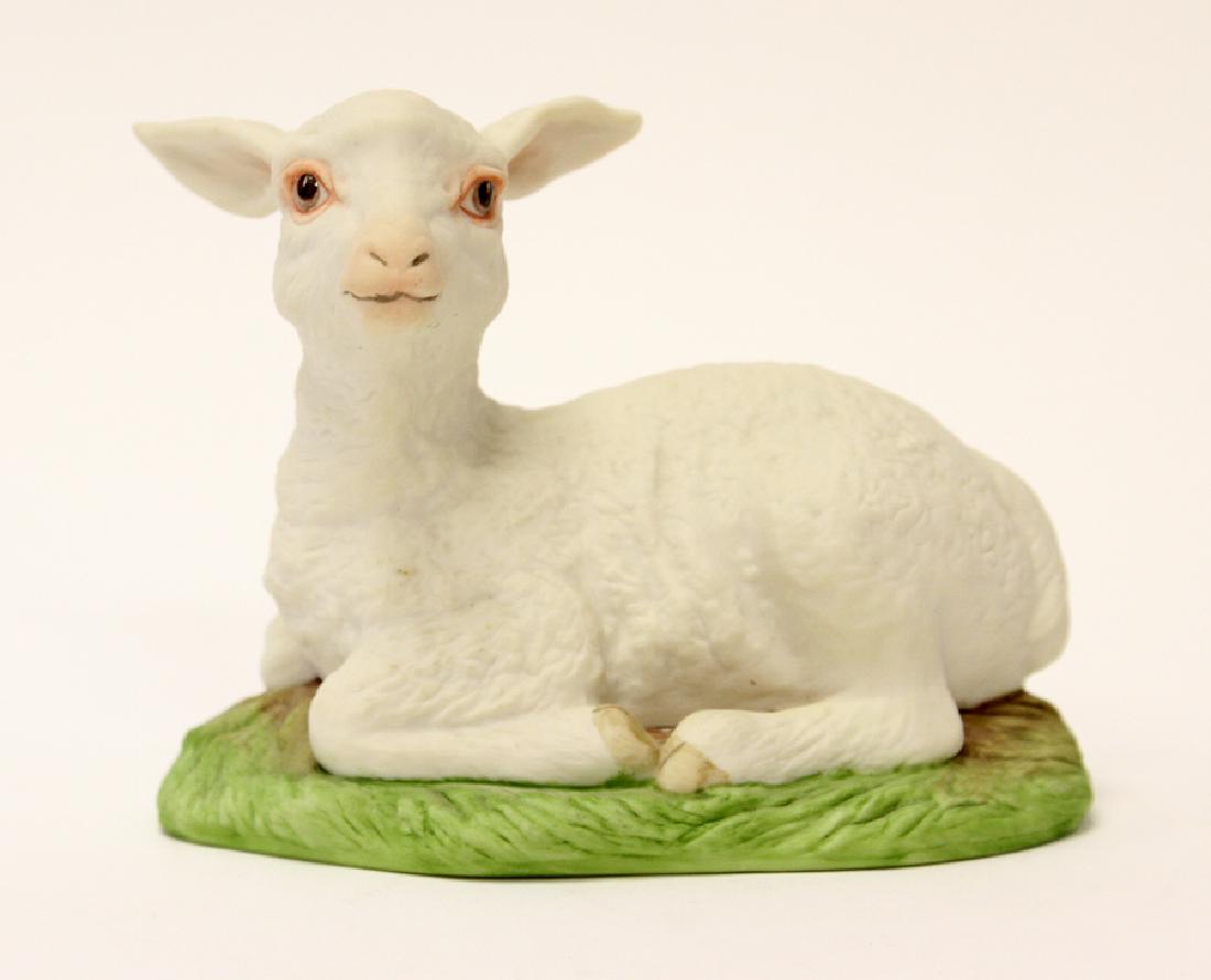 BOEHM SIGNED, BISQUE PORCELAIN LAMB, 400-97: BOEHM SIGNED, BISQUE PORCELAIN LAMB, 400-97, H 4", W 5", D 3" Edward Marshall Boehm signed bisque porcelain lamb, #400-97. Signed and marked on the underside.