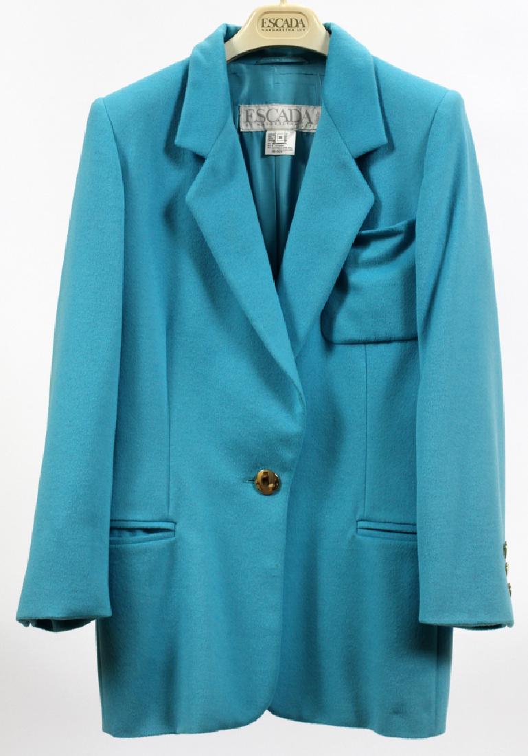 ESCADA CASHMERE BLAZER SIZE 36: ESCADA CASHMERE BLAZER SIZE 36 Margaretha Ley Escada blazer is turquoise in color with a single button front closure. Each sleeve is embellished with 3 buttons at the cuff. There is one pocket at the