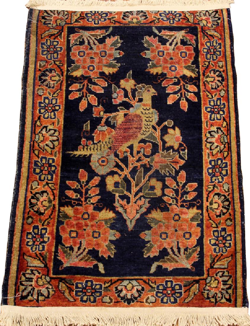 PERSIAN ANTIQUE SAROUK WOOL MAT, CIRCA 1920: PERSIAN ANTIQUE SAROUK WOOL MAT, CIRCA 1920, W 1' 9", L 2' 6" Having a central navy field with bird and flower motif.