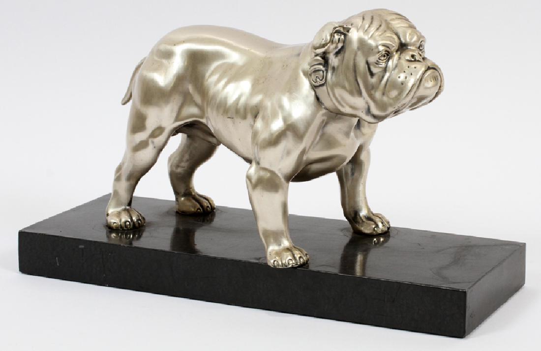 J.B. STEEL BULLDOG SCULPTURE, ON A METAL BASE: J.B. STEEL BULLDOG SCULPTURE, ON A METAL BASE, H 6.5", L 11", D 4"The Bulldog is marked J.B. 1008. 1008 is a standard grade Carbon Steel. The base is marked J.B. as well but the base is not marked 100