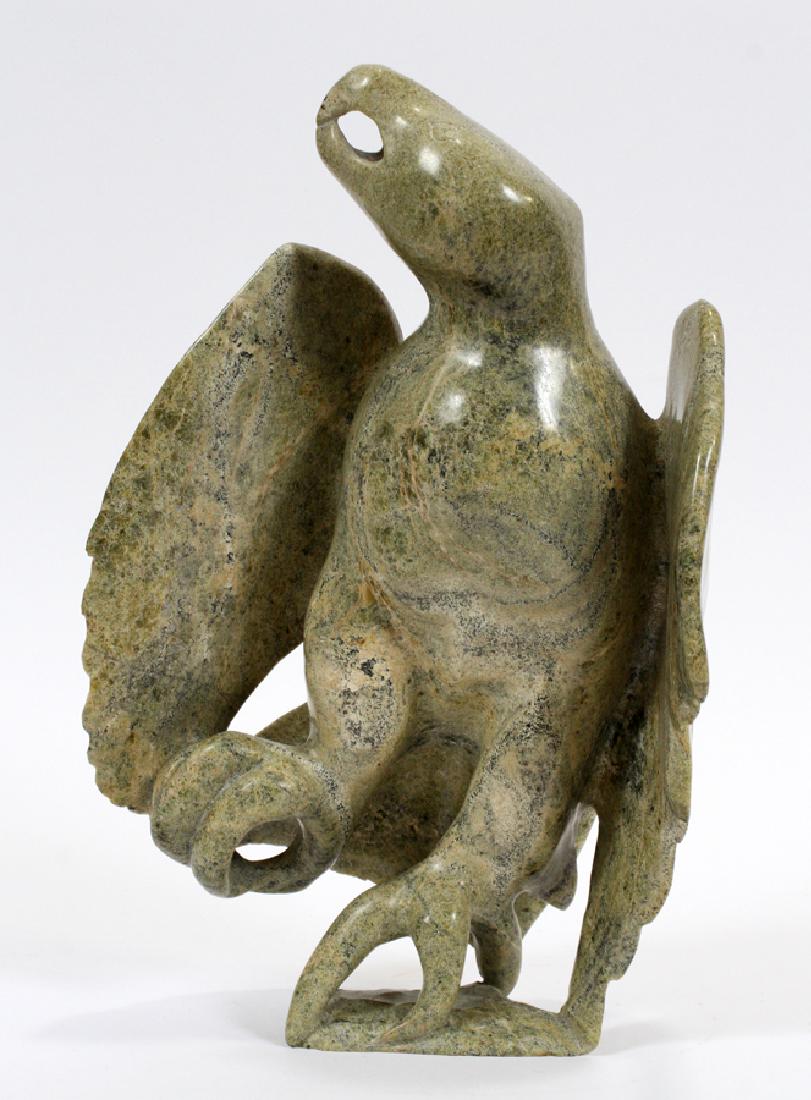 CANADIAN INUIT SOAPSTONE CARVING: CANADIAN INUIT SOAPSTONE CARVING, H 12 1/2", W 8 1/4", D 3 3/4":A Canadian soapstone carving attributed to Inuit culture. This piece depicts an eagle with its wings stretched and having an upward gaze