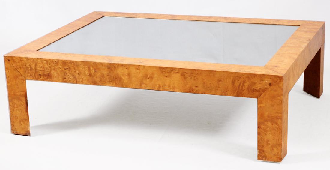 ITALIAN, BURL WOOD MIRRORED COFFEE TABLE: ITALIAN, BURL WOOD MIRRORED COFFEE TABLE, H 14", W 36", L 48" :A COFFEE TABLE, HAVING A MIRRORED TOP WITH BURL WOOD VENEER, 4" BORDER. STANDING ON FOUR TRIANGULAR LEGS.