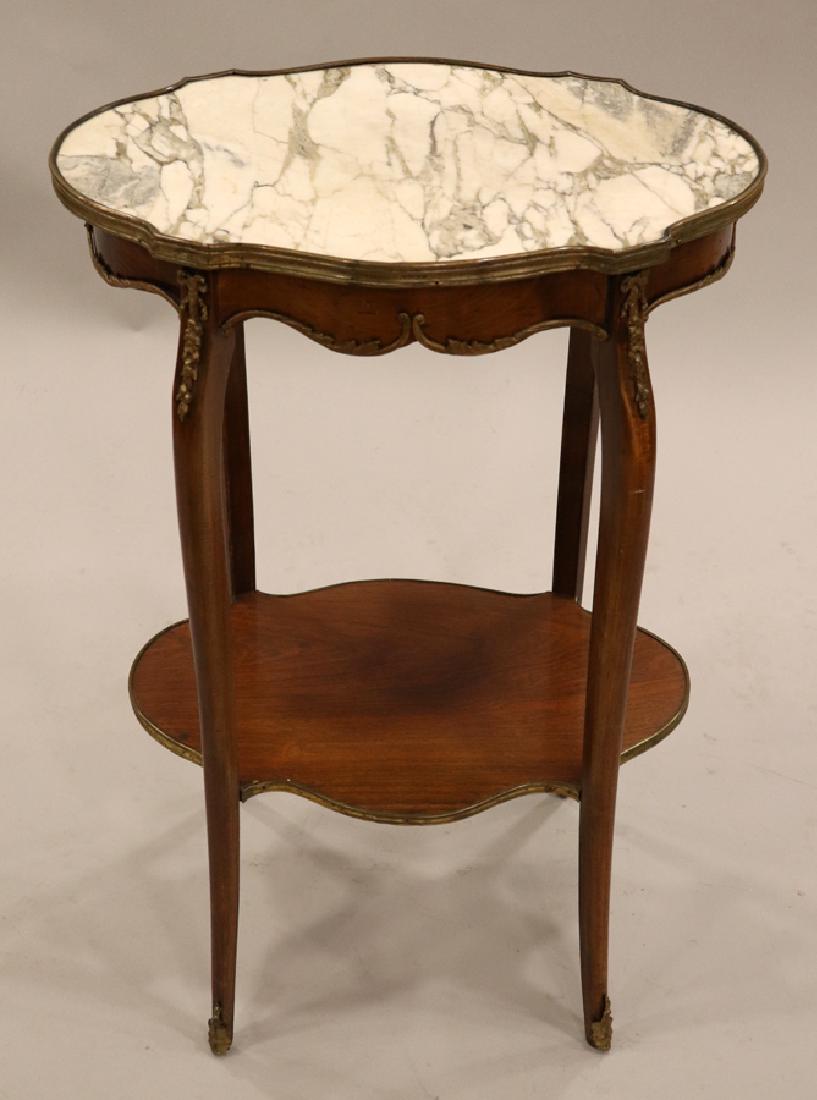 LOUIS XV STYLE MARBLE & WOOD END TABLE: LOUIS XV STYLE MARBLE & WOOD END TABLE, H 29", W 20 1/2", D 14 1/2":A Louis XV style marble top end table that features cabriole legs adorned with ormolu embellishments. Having a singular lower shelf.