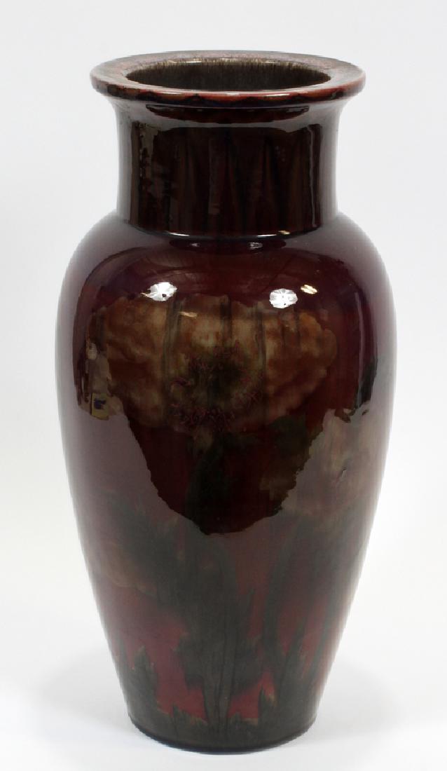 ROOKWOOD POTTERY BLACK OPAL VASE, C. 1926: ROOKWOOD POTTERY, SARA SAX, BLACK OPAL VASE, C. 1926, H 18", DIA 9":A Rookwood Pottery Company black opal porcelain vase featuring a purple iridescent gloss finish with a graceful floral Art Deco moti