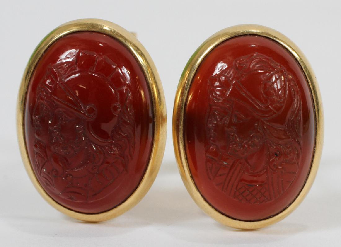 CARVED CABOCHON CARNELIAN, 14KT GOLD CUFF LINKS: CARVED CABOCHON CARNELIAN, 14KT GOLD CUFF LINKS, H 1", W 3/4" :Carved cabochons feature the double profile of a Roman soldier, possibly a reference to Janus.