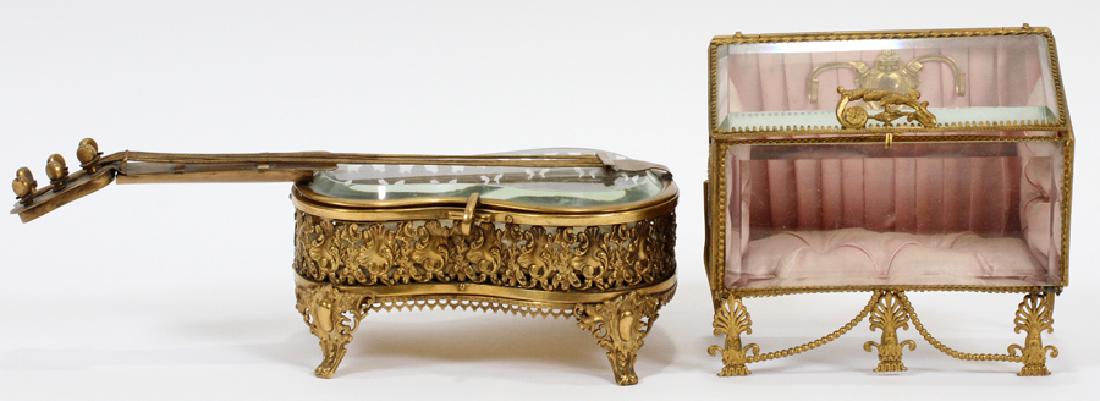 VICTORIAN STYLE JEWELRY CASKETS, 2 PCS: VICTORIAN STYLE JEWELRY CASKETS, 2 PCS, H 5 1/4", W 5 3/4", D 2 3/4":A pairing of Victorian style jewelry caskets. Each piece features beveled crystal walls with gilt brass and semi-precious metal emb
