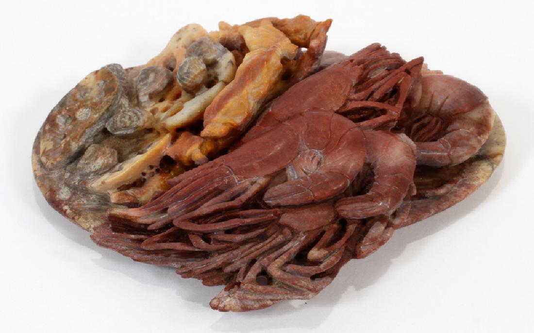CHINESE SOAPSTONE CARVING SEAFOOD PLATTER: CHINESE SOAPSTONE CARVING, H 1 1/2", W 5 1/2", D 4 1/2", SEAFOOD PLATTER :An exquisitely detailed Chinese soapstone carving. This piece depicts a delicious platter of clams, prawn, and lotus roots. Pl