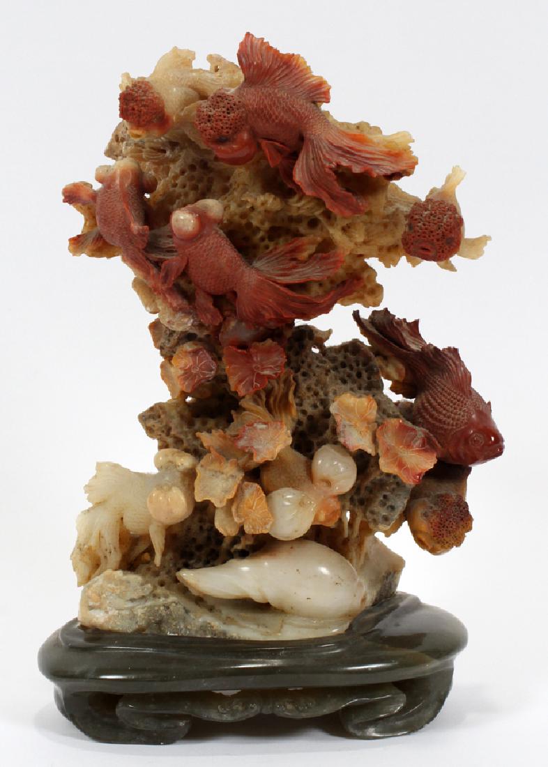 CHINESE SOAPSTONE CARVING FISH AND CORAL: CHINESE SOAPSTONE CARVING, H 10", W 6 1/2", D 4", FISH AND CORAL :An exquisitely detailed Chinese soapstone carving. This piece depicts a dynamic school of Chinese oranda goldfish, Celestial eye goldf