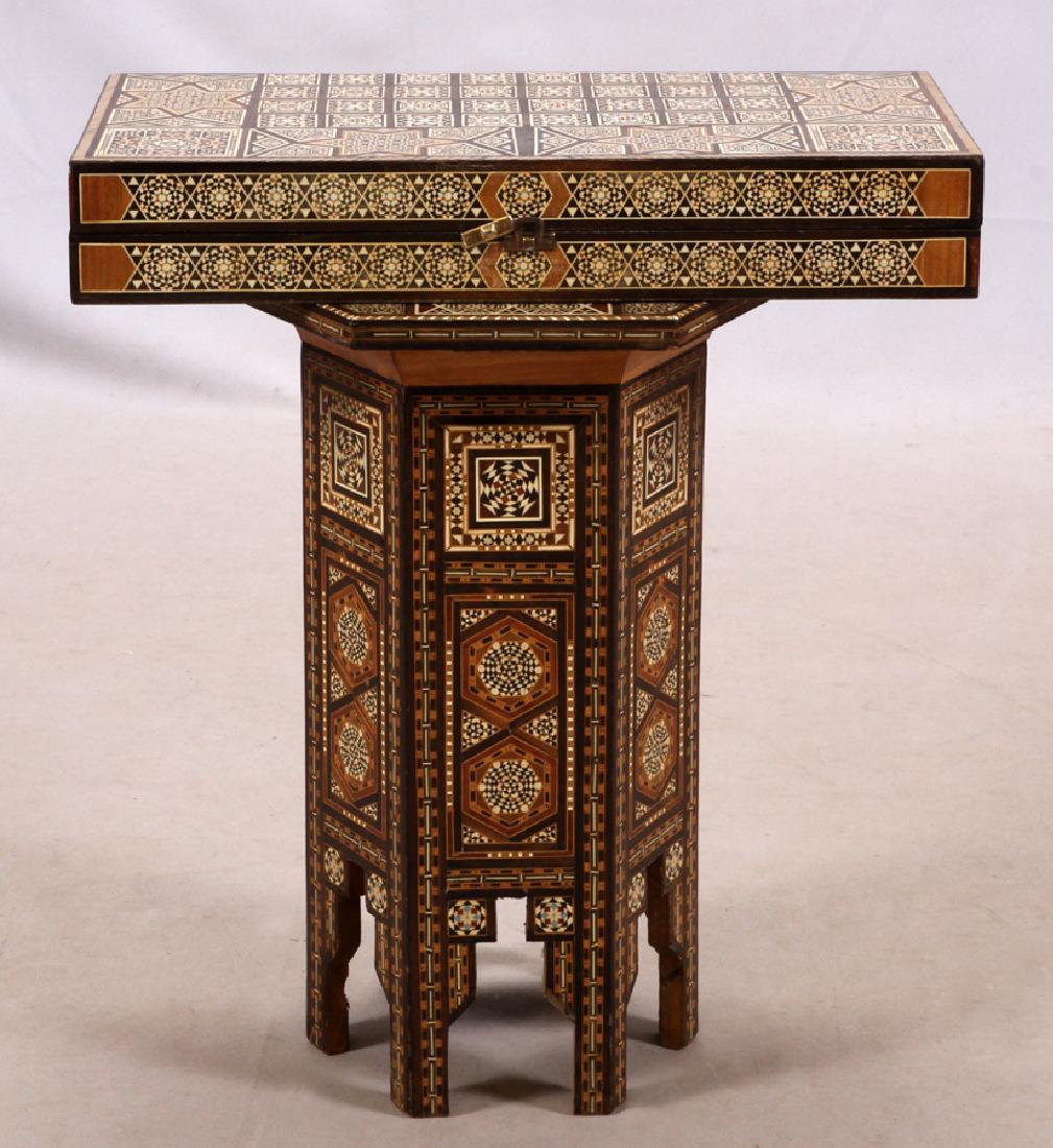DAMASCUS SYRIA BACKGAMMAN BOARD & TABLE: DAMASCUS SYRIA BACKGAMMAN BOARD & TABLE, H 19 1/2", W 12 1/4" :Backgammon board and table geometric inlaid design. 19 3/4 x 19 3/4.