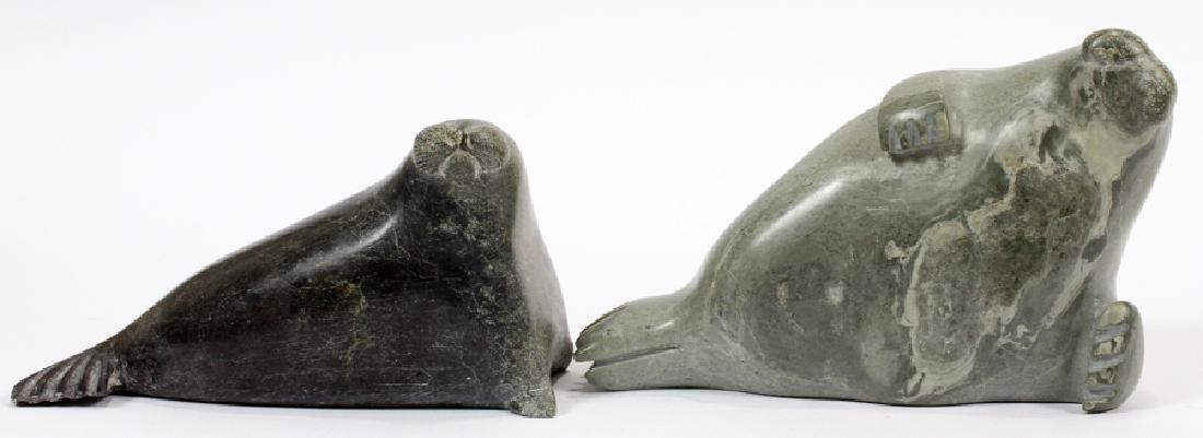INUIT SOAPSTONE CARVINGS, 2 PCS: INUIT SOAPSTONE CARVINGS, 2 PCS, H 5 1/2", L 8", BEACHED WALRUSES :A pairing of Inuit soapstone carvings. This lot includes two beached walruses, both reclining on their sides. Each piece having date,