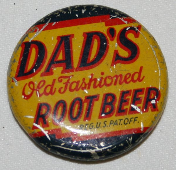 US, LINCOLN WHEAT COPPER CENT, IN BOTTLE TOP: US, LINCOLN WHEAT COPPER CENT, ENCASED IN BOTTLE TOP, 1947-S, MS-65, DIA 1":encased in Dad's Old Fashioned Root Beer bottle top; Reg. US pat. Office. (CCS) Color, yellow/black & red tin enamel overlay