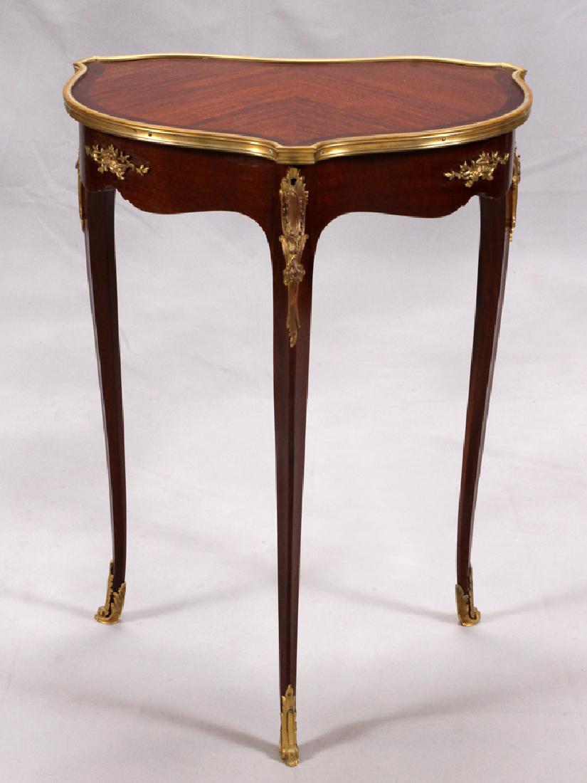 FRENCH, LOUIS XV, MAHOGANY & BRONZE VANITY TABLE: FRENCH, LOUIS XV, MAHOGANY & BRONZE VANITY TABLE, 19TH C., H 29", W 21", D 15" :Bronze edged top, with ormolu mounts on the contoured skirts and at the top and bottom of the tapered legs. Hinged top o