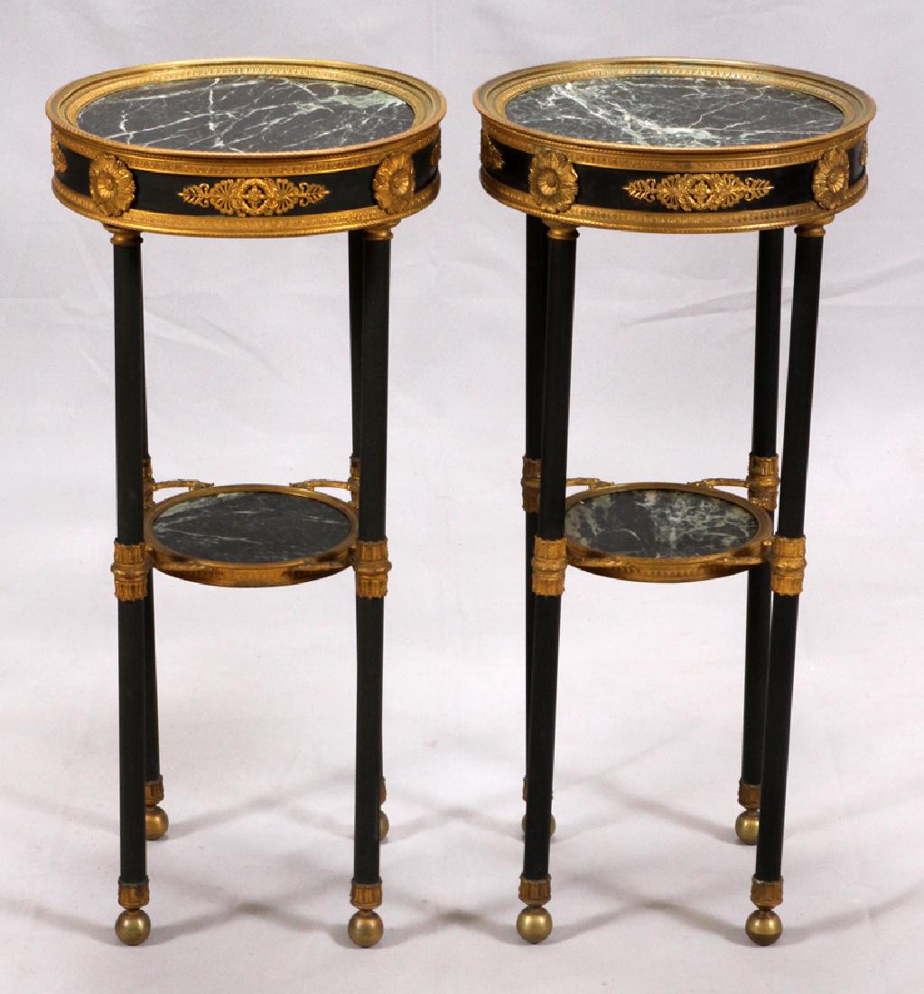 FRENCH, EMPIRE STYLE MARBLE TOP TABLES, PAIR: FRENCH, EMPIRE STYLE MARBLE TOP TABLES, PAIR, H 27", DIA 12 1/2" :Bronze edge to a green marble top. Marble shelf. Straight legs.