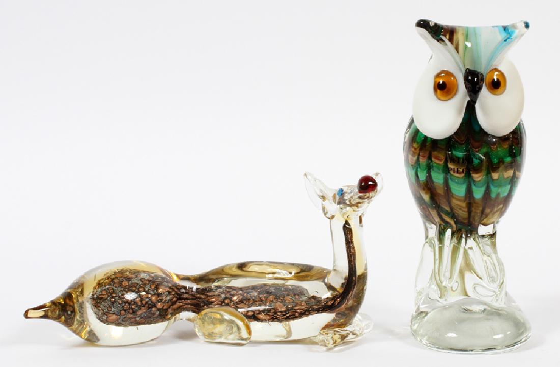 MURANO ITALIAN GLASS FIGURINES OWL AND DEER: MURANO ITALIAN GLASS FIGURINES, H 9", DIA 3", OWL AND DEER:A coupling of hand-blown, vintage Murano art glass woodland animals boasting bright green, brown, and gold tones. The owl is perched on a cle