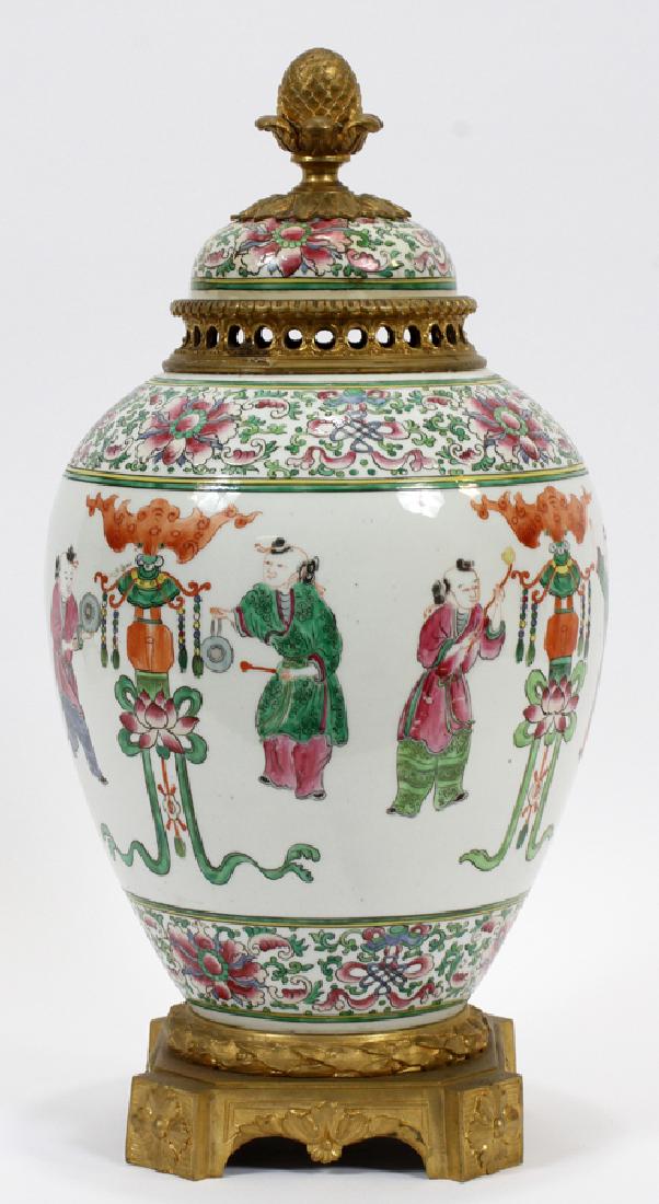 CHINESE PORCELAIN & FRENCH BRONZE GINGER JAR: CHINESE, PORCELAIN & FRENCH BRONZE MOUNTED GINGER JAR, 19TH.C. H 16", DIA 8" :Bronze acorn finial on a porcelain top. Dancing figures with floral borders.