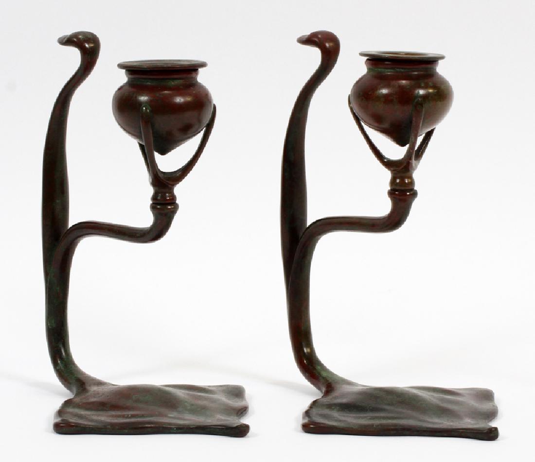 TIFFANY STUDIOS BRONZE CHAMBER CANDLESTICKS: TIFFANY STUDIOS BRONZE CHAMBER CANDLESTICKS #1203 PAIR H 7.25" :impressed #1203. W 6". Brown green patina.