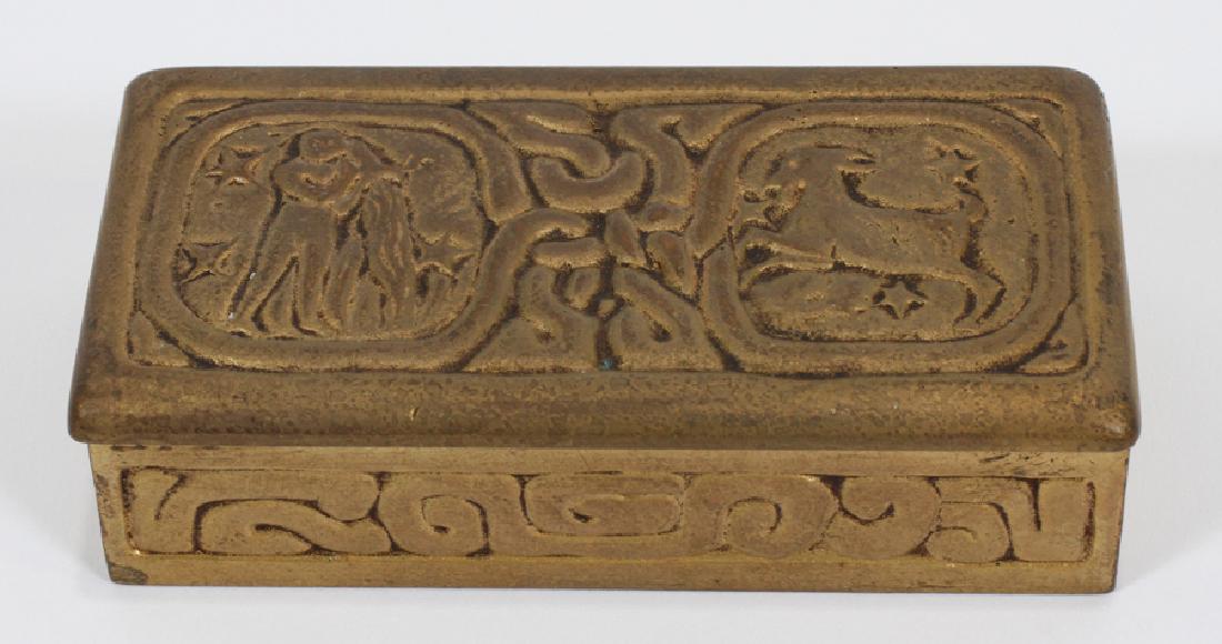 TIFFANY STUDIO, BRONZE "ZODIAC" STAMP BOX: TIFFANY STUDIO, BRONZE "ZODIAC" STAMP BOX, H 1/2", W 3 3/4", D 2" :#802. Hinged cover, divided interior.