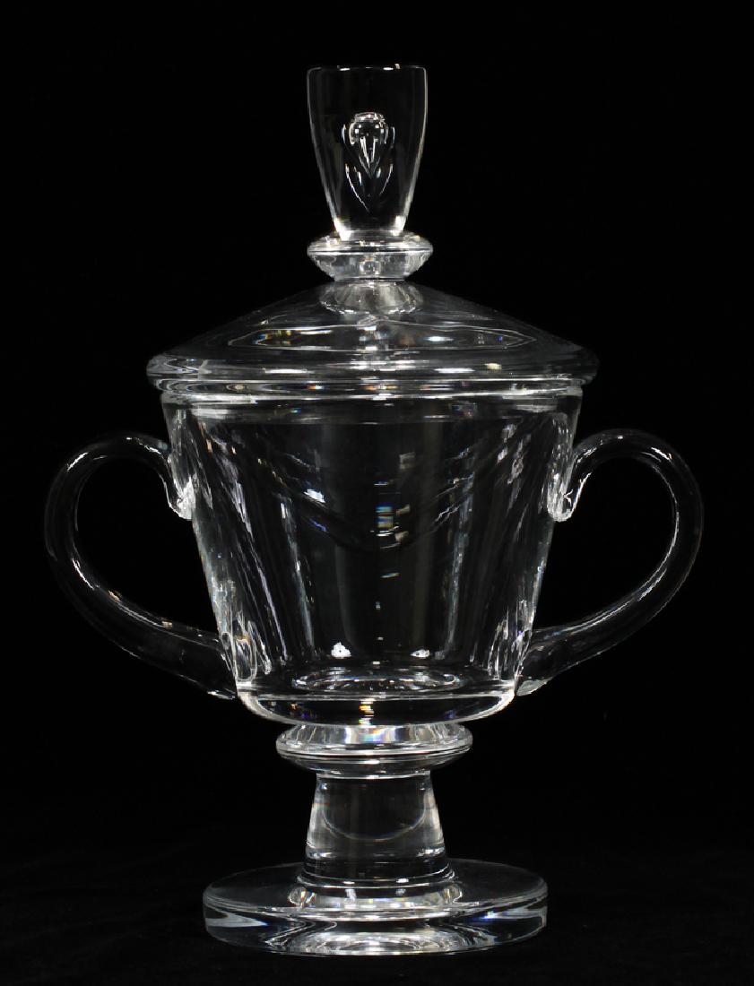 STEUBEN CRYSTAL COVERED URN, PEDESTAL BASE: STEUBEN CRYSTAL COVERED URN, PEDESTAL BASE, TEARDROP IN STEM H 11" W 8" :Double handles. Signed. From a Preston Place Grosse Pointe Farms mansion.