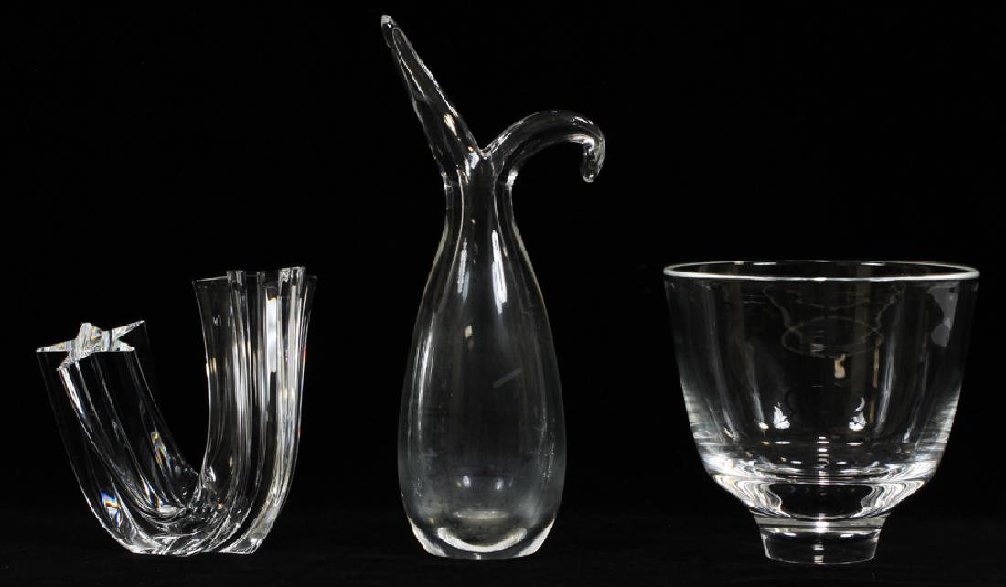 STEUBEN CRYSTAL VASE AND STEUBEN BUD VASE: STEUBEN CRYSTAL VASE H 5" DIA 5.5" AND STEUBEN BUD VASE H 10" :.Both signed Steuben. Vase is in good condition. Bud vase has calcide residue. jw