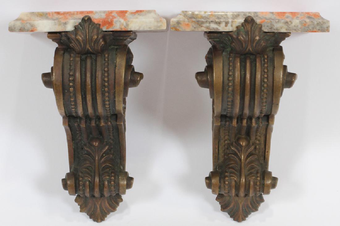 MARBLE & BRONZE WALL MOUNTED BRACKET SHELVES, PAIR: MARBLE & BRONZE WALL MOUNTED BRACKET SHELVES, PAIR, H 9", L 6", D 4 1/4" :Salmon to gray colored beveled marble tops, with scrolling bronze supports.