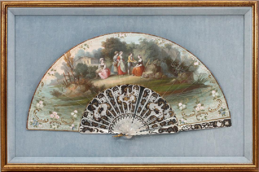 FRENCH HAND-PAINTED PLEATED FAN: FRENCH HAND-PAINTED PLEATED FAN, H 10", W 20", IN A SHADOWBOX FRAME :PLEATED PAPER FAN PAINTED WITH AN 18TH CENTURY STYLE SCENE OF A COURTING COUPLE AND CHAPERONES IN A PROVINCIAL SETTING, WITH MOTHER