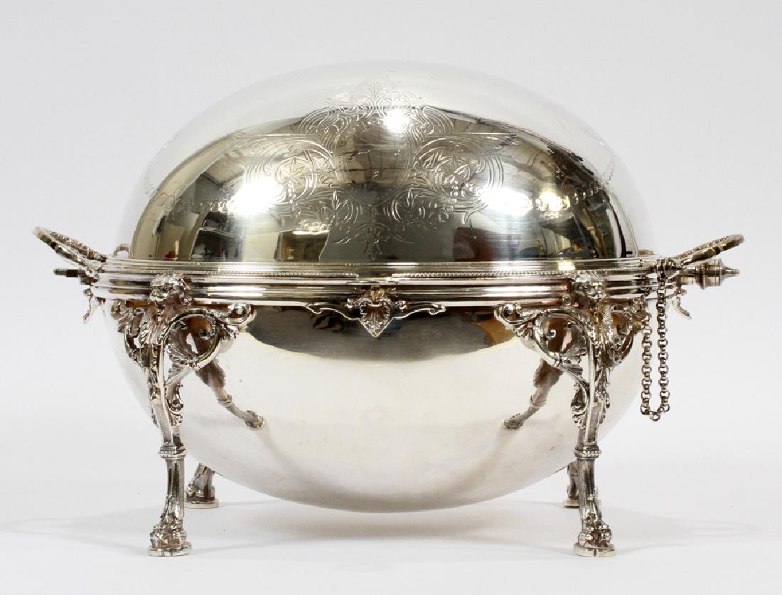 FOOTED ROCOCO SHEFFIELD PLATE DOMED SERVING DISH: FOOTED ROCOCO SHEFFIELD PLATE DOMED SERVING DISH H 10" DIA 14.5" :Oval form vegetable server. Having lion head and acanthus leaf form legs and chasing on the pull over top. Having two inserts; one sol