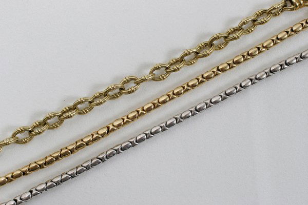 18K YELLOW & W/GOLD CHAIN LINK BRACELETS,: 18KT. 750 YELLOW & WHITE GOLD CHAIN LINK BRACELETS, C1970, 3 PCS., L 7":approximately 60 grams; Lobster clasp. One bracelet is marked Lagose.